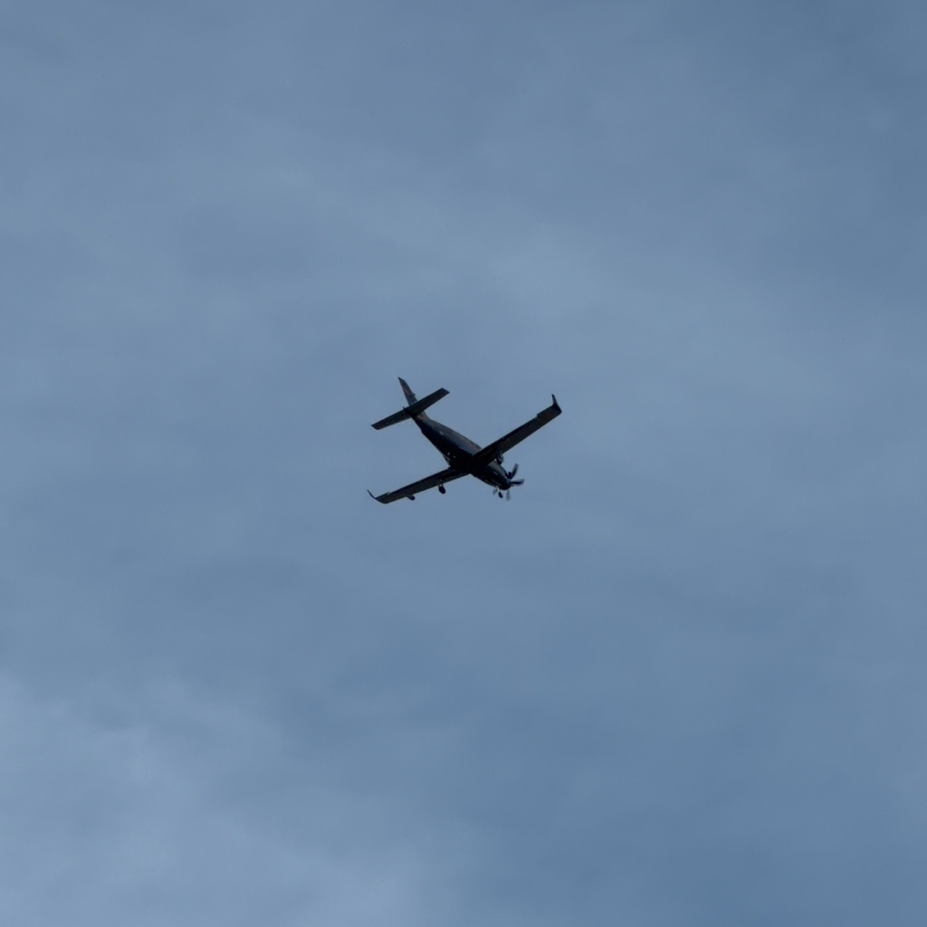 Daher TBM 940 N980MM descending on approach near Broomfield Colorado at dusk